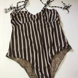Acacia one piece size large. Used. No returns
